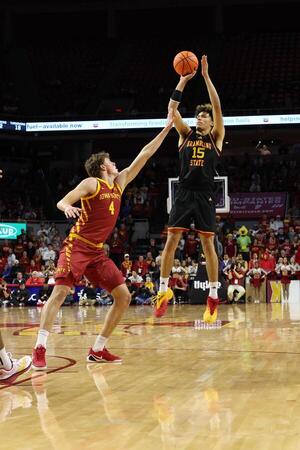 Grambling State Tigers forward Antonio Munoz (15) shoots over Iowa State Cyclones forward Eric Mulder (4) during the second half at James H. Hilton Coliseum. editorial_image
