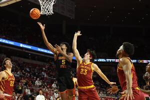 Grambling State Tigers Jimel Lane (5) scores in front of Iowa State Cyclones forward Blake Buchanan (23) during the second half at James H. Hilton Coliseum. editorial_image