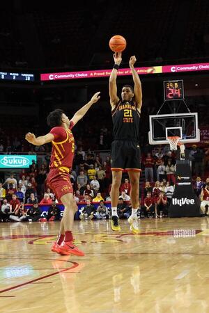 Grambling State Tigers forward Devyn Franklin (21) shoots over Iowa State Cyclones forward Xzavion Mitchell (55) during the second half at James H. Hilton Coliseum. editorial_image