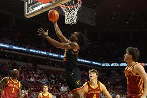 Grambling State Tigers forward Richard Amaefule (10) beats Iowa State Cyclones forward Eric Mulder (4) to the basket during the second half at James H. Hilton Coliseum. editorial_image