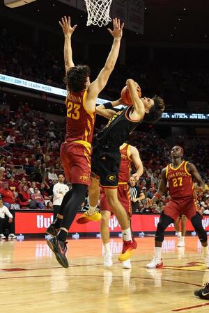 Iowa State Cyclones forward Blake Buchanan (23) defends the shot from Grambling State Tigers forward Antonio Munoz (15) during the second half at James H. Hilton Coliseum. editorial_image