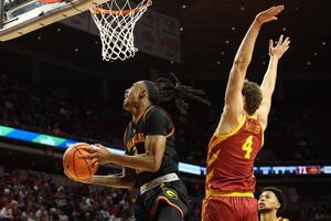 Iowa State Cyclones forward Eric Mulder (4) defends Grambling State Tigers forward Rickey Ballard (3) during the second half at James H. Hilton Coliseum. editorial_image