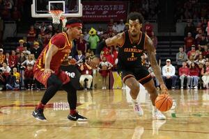 Iowa State Cyclones guard Tamin Lipsey (3) defends Grambling State Tigers forward Roderick Coffee III (1) during the second half at James H. Hilton Coliseum. editorial_image