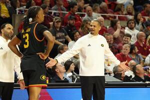 Grambling State Tigers head coach Patrick Crarey II talks with Grambling State Tigers forward Rickey Ballard (3) after he received a technical found in their game with the Iowa State Cyclones during the second half at James H. Hilton Coliseum. editorial_image