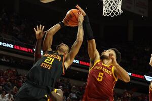 Grambling State Tigers forward Devyn Franklin (21) has his shot blocked by Iowa State Cyclones forward Joshua Jefferson (5) during the second half at James H. Hilton Coliseum. editorial_image