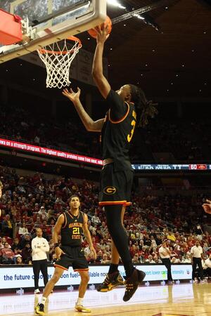 Iowa State Cyclones guard Tamin Lipsey (3) scores against the Iowa State Cyclones during the second half at James H. Hilton Coliseum. editorial_image
