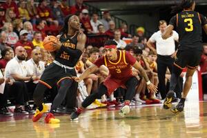 Iowa State Cyclones guard Tamin Lipsey (3) defends Grambling State Tigers guard Derrius Ward (0) during the first half at James H. Hilton Coliseum. editorial_image