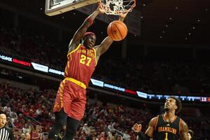 Grambling State Tigers forward Roderick Coffee III (1) watches the dunk from Iowa State Cyclones guard Killyan Toure (27) during the first half at James H. Hilton Coliseum. editorial_image