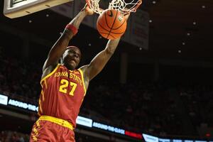 Iowa State Cyclones guard Killyan Toure (27) dunks against the Grambling State Tigers during the first half at James H. Hilton Coliseum. editorial_image