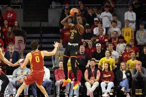 Grambling State Tigers guard Derrius Ward (0) shoots over Iowa State Cyclones guard Nate Heise (0) during the first half at James H. Hilton Coliseum. editorial_image