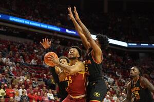 Grambling State Tigers forward Antonio Munoz (15) defends Iowa State Cyclones forward Joshua Jefferson (5) during the first half at James H. Hilton Coliseum. editorial_image
