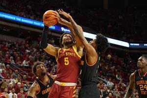 Grambling State Tigers forward Antonio Munoz (15) defends Iowa State Cyclones forward Joshua Jefferson (5) during the first half at James H. Hilton Coliseum. editorial_image
