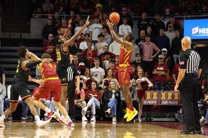 Grambling State Tigers forward Richard Amaefule (10) defends the shot from Iowa State Cyclones guard Jamarion Batemon (1) during the second half at James H. Hilton Coliseum. editorial_image