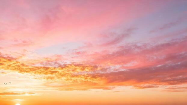 Sky ablaze with fiery sunset colors and wispy clouds. photo
