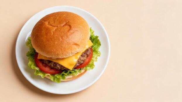 Freshly prepared cheeseburger on a white plate with copy space. photo