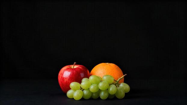 Assortment of fresh, vibrant fruits displayed against a dark background photo