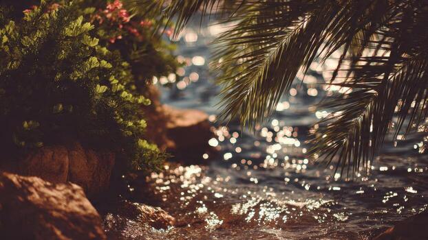 Lush green foliage and palm fronds frame sparkling water surface with bokeh lights photo