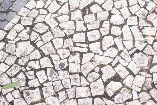 Texture of a street pavement with square and rectangular stones. Geometric pattern. Background. Abstract. Copy space. photo