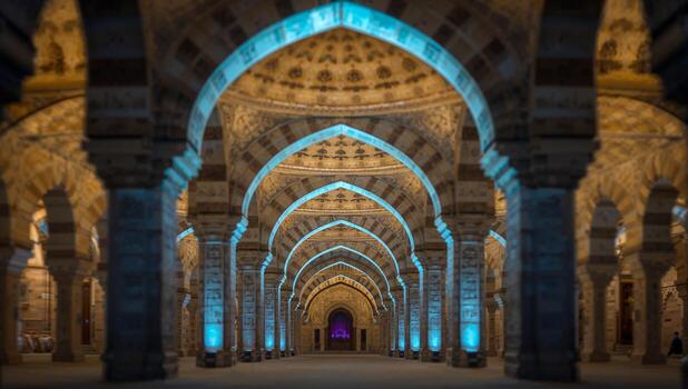 Abstract Arches and Columns with Azure Illumination, Patterned Interiors. photo