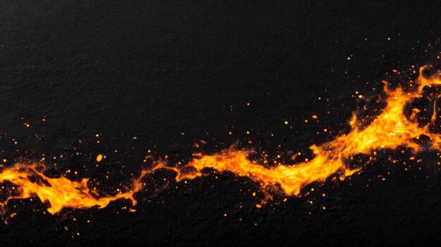 Abstract design of orange flames against a black background. photo
