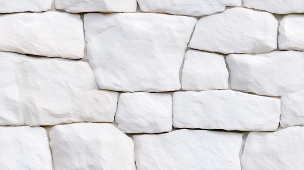 A close-up view of a textured, white stone wall, showcasing irregular, interlocking pieces arranged in a regular pattern. photo