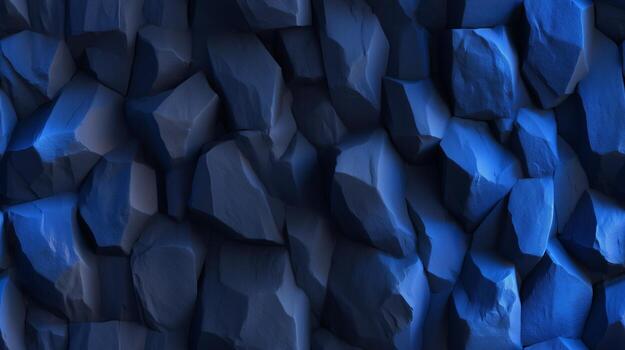 A close-up view of a textured rock face, showcasing deep blues and dramatic shadows. photo