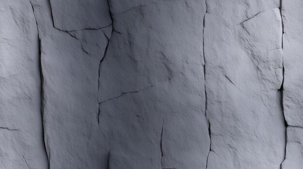 A detailed close-up view of a textured stone wall, exhibiting deep, vertical cracks and a muted gray color palette. photo