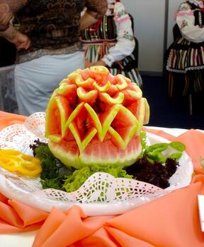 Intricate Watermelon Slice Pattern Adorns a Vibrant Platter at a Festive Culinary Showcase Event photo