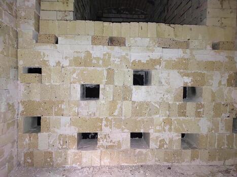 Unique Brick Pattern in an Abandoned Structure Showcases Forgotten Architectural Beauty photo