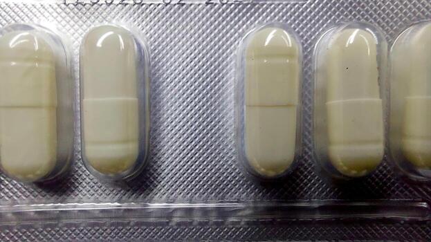 Capsules in a Blister Pack Arranged Neatly on a Surface in a Clinical Setting photo