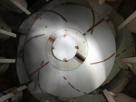 Exploring the Intricate Details of a Drying Drum in an Industrial Setting During Daytime photo