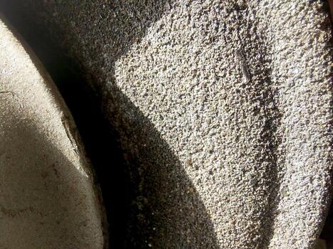 Detailed View of a Grinding Wheel Designed for a Grinding Machine Used in Metalworking Tasks photo