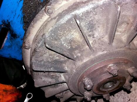 Hydraulic Drive Clutch Component Viewed in a Workshop Setting During Mechanical Repairs photo