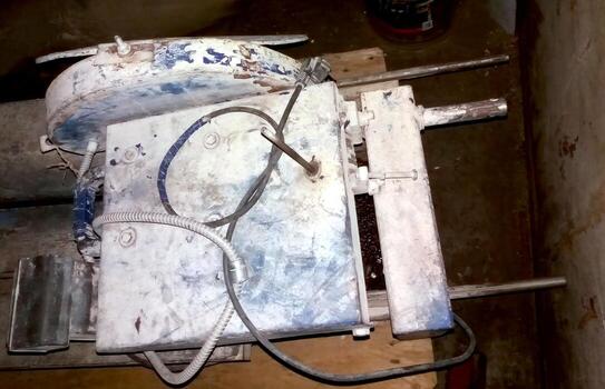 Stone Cutting Machine on a Workbench in a Workshop During the Day photo