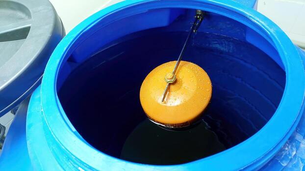 Essential Function of a Water Valve Float Controlling Water Levels in a Tank photo