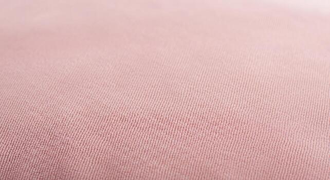 Soft textured pink fabric with subtle gradient and delicate weave pattern photo