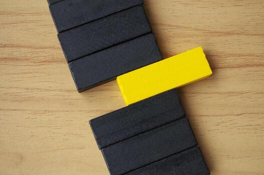 Top view of black and yellow blocks with customizable space for text. photo