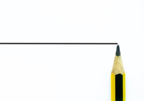 Horizontal ruled paper with a pencil tip at the edge, ample copy space for notes and clean minimal plannin photo