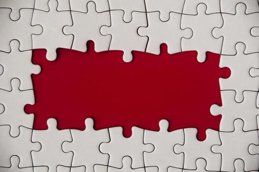 Top view of blank spaces on jigsaw puzzle with. Customizable space for text. photo