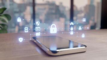 Smartphone on table with glowing cybersecurity icons. Represents data protection, digital privacy, network security, internet safety. Modern technology concept. video