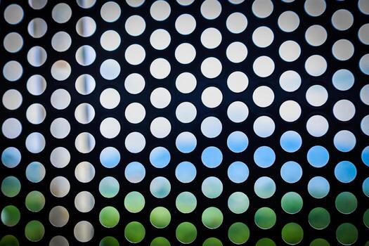 Macro View Circle Pattern Metal Grill with Blurred Background Texture photo