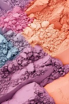 Creative ideas emerge from scattered colorful powders in soft hues, forming abstract shapes and textures. photo