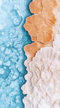 Abstract blue liquid with beige and white textured surface. Top view of mineral formations. Natural patterns and design backgrounds. photo