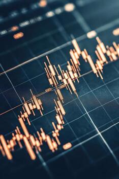 Candlestick Chart Displays Data for Cryptocurrency Trading on a Screen Showing Fluctuations and Market Analysis photo