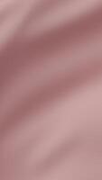 mjuk röd ark tyg vinka försiktigt i slät rörelse skapande lugna elegant minimal bakgrund textur med naturlig veck, eleganta pastell tona avkopplande estetisk idealisk för design, , eller dekoration video