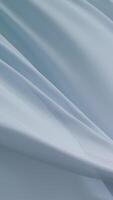 mjuk ljus blå tyg strömmande graciöst i luft skapande elegant minimal textur bakgrund med mild veck slät yta och delikat rörelse symboliserar stillhet skönhet, och modern visuell harmoni video