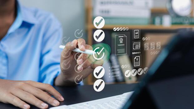 Business person using digital checklist and workflow management system on virtual screen photo