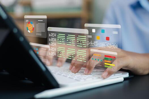 Developer coding data analysis dashboard on laptop with virtual interface, software engineer programming digital system photo