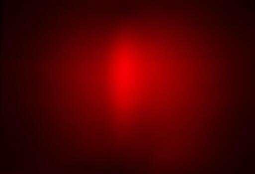 Red glowing abstract background with soft gradient of light and shadow photo