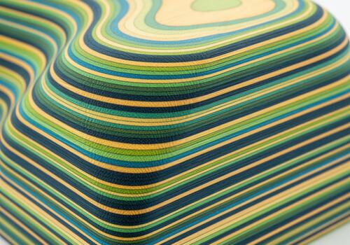 Vibrant layered wood texture with undulating topographic contour lines photo